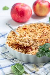 Apple crumble is traditional summer dessert.