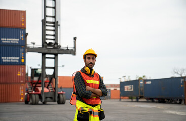 Portrait of Foreman smiling while standing in container yard for check cargo transportation import - export. Logistic concept.