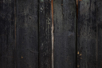 The old black wood texture with natural patterns