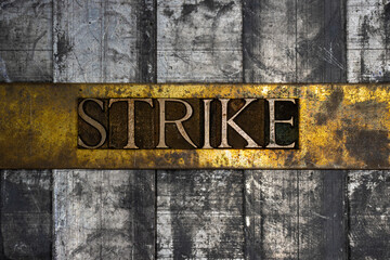 Strike text message on textured grunge copper and vintage gold background