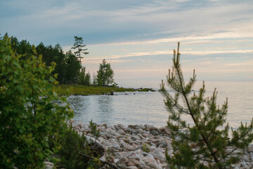 Picturesque view of Lake Baikal in sunrise .Rift lake located in southern Siberia, Russia. The largest freshwater lake by volume in the world. A Natural Wonder Of The World.