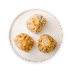 Fried Georgian khinkali with meat on white plate top view isolated on white background