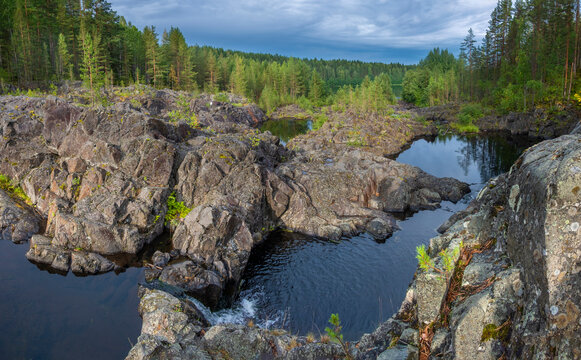 small waterfall on Poor porog, threshold, on the river Suna Karelia, Russian landscape summer
