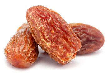 Micro close-up and details of Organic dried date or chhuhara (Phoenix dactylifera)  isolated over white background.