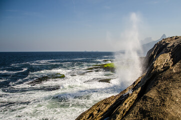 waves crashing on rocks