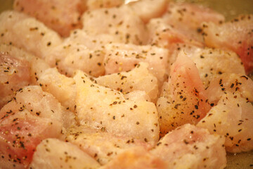 Prepping and seasoning grouper meal 