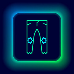 Glowing neon line Pants icon isolated on black background. Colorful outline concept. Vector