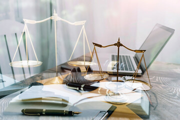 Business and lawyers discussing contract papers with brass scale on desk in office. Law, legal services, advice, justice and law concept picture with film grain effect