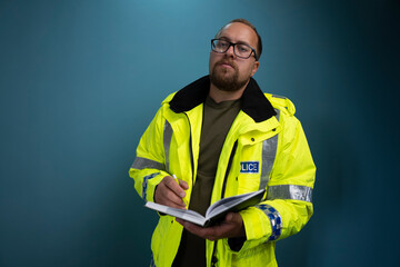 Policeman in reflective uniform isolated on background.