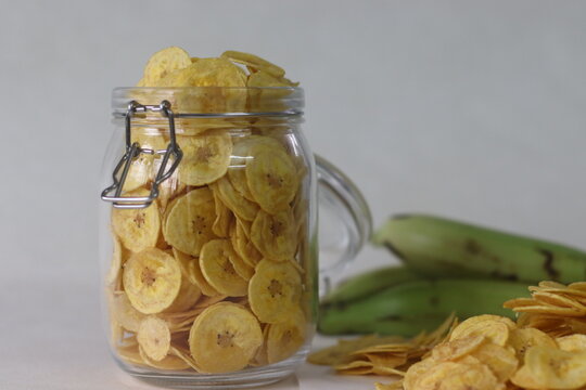 Fried banana chips made by deep frying under ripe banana slices. A main item of vegetarian Onam meals popularly called ethakka upperi
