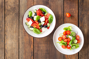 salads menu different types of vegetables, meat, herbs fresh portion ready to eat meal snack on the table copy space food background rustic. top view keto or paleo diet