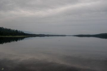 Serene lake during the hazy day