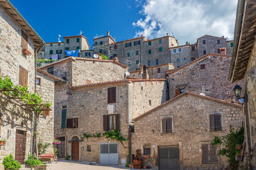 Italian medieval village details, historical stone square, old city stone buildings architecture. Santa Fiora, Tuscany, Italy.