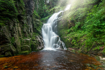 Naklejka premium Waterfall in the mountains - Kamienczyka waterfall - Szklarska Poreba - Poland