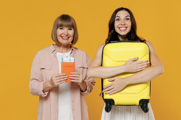 Traveler tourist woman wear summer casual clothes hat isolated on pastel pink color background studio. Passenger travel abroad on weekends getaway. Air flight journey concept
