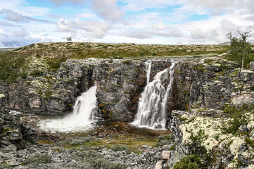 Obraz premium The Storulfossen Waterfall in the Rondane National Park in Norway.