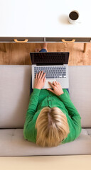 Young woman using her laptop