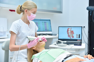 Orthodontist scaning patient with dental intraoral scanner - obrazy, fototapety, plakaty