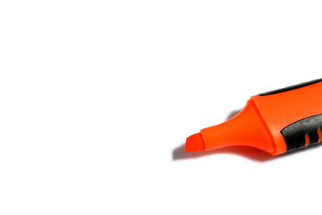 Orange marker without cap on white background
