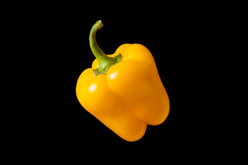 yellow pepper isolated on black