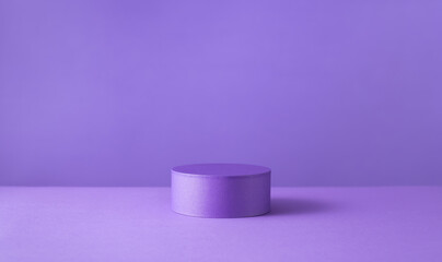 Podium or pedestal for products display on purple background.