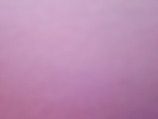 Purple solid color surface of colored paper as a background. High quality photo