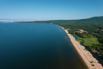 Summertime imagery of Lake Baikal is a rift lake located in southern Siberia, Russia. Baikal lake summer landscape view. Drone's Eye View.