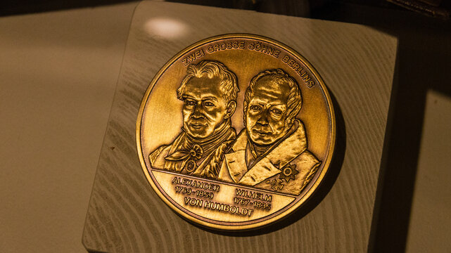 GOLDKRONACH, GERMANY - Nov 15, 2018: Gold coin depicting Alexander von Humboldt in a Museum