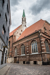 Fototapeta na wymiar Riga old town s street view near Lutheran St. John s Church, Latvia