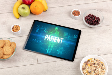 Tablet Pc with fruits, medical concept