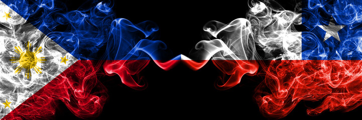 Philippines, Filipino vs Chile, Chilean smoke flags side by side.