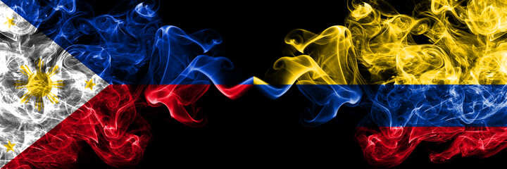 Philippines, Filipino vs Colombia, Colombian smoke flags side by side.