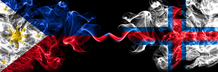 Philippines, Filipino vs Faroe Islands, Faroese smoke flags side by side.