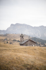 little stone church in the mountains of italy