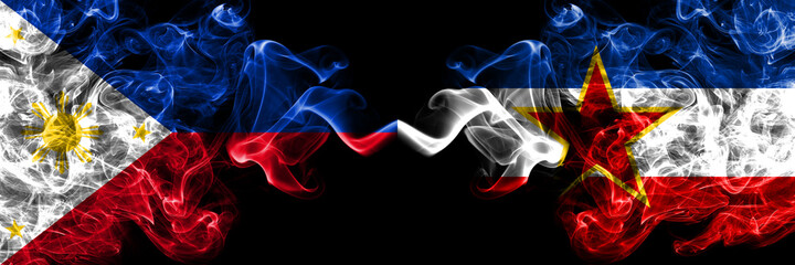 Philippines, Filipino vs Yugoslavia, Yugoslavian smoke flags side by side. - obrazy, fototapety, plakaty