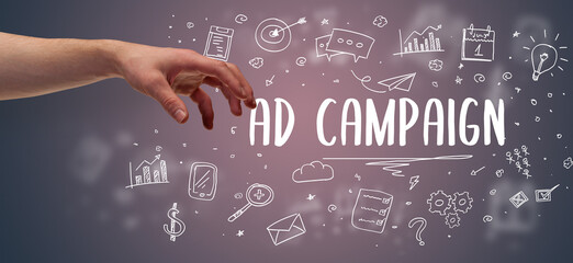 Close-Up of cropped hand pointing at business inscription