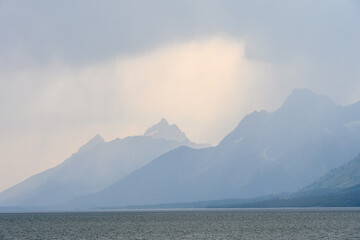 Stormy weather and wildfire smoke over Jackson Lake, Grand Teton National Park, USA
