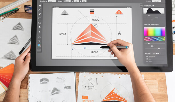 Graphic designer drawing sketches logo design.