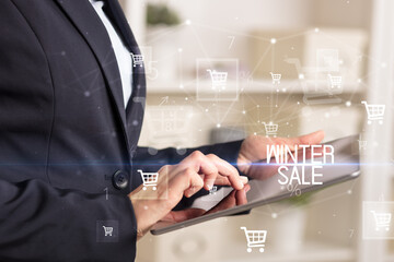 Young person makes a purchase through a tablet