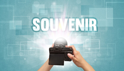 hand holding digital camera, traveling concept