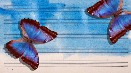 Morpho blue butterfly and notes. Butterfly melody. Photo of old music sheet in blue watercolor...