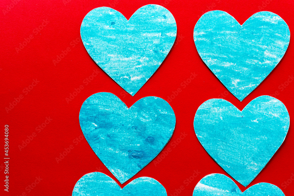 Poster watery blue hearts on a red background