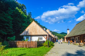 SANOK, POLAND, 22 AUGUST 2018: Old wooden buildings of the open-air museum (or skansen)