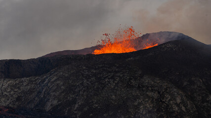 Beautiful aerial view of the Active Volcano with red Lava in Iceland