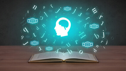 Open medical book with health icons above