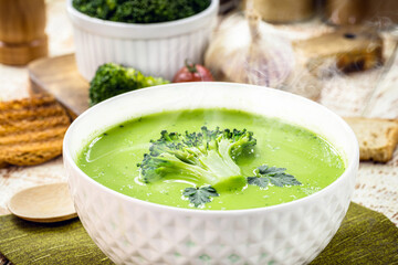 broccoli and green vegetable soup, creamy diet soup, served hot