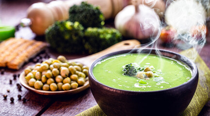 green vegetable cream, with peas, spinach and broccoli, homemade soup served warm in winter
