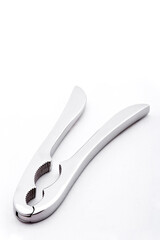 Nut tongs isolated on white background with space for text