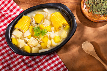 Colombian cuisine - ajiaco soup with chicken and vegetables