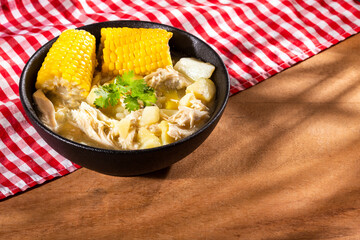 Colombian cuisine - ajiaco soup with chicken and vegetables
